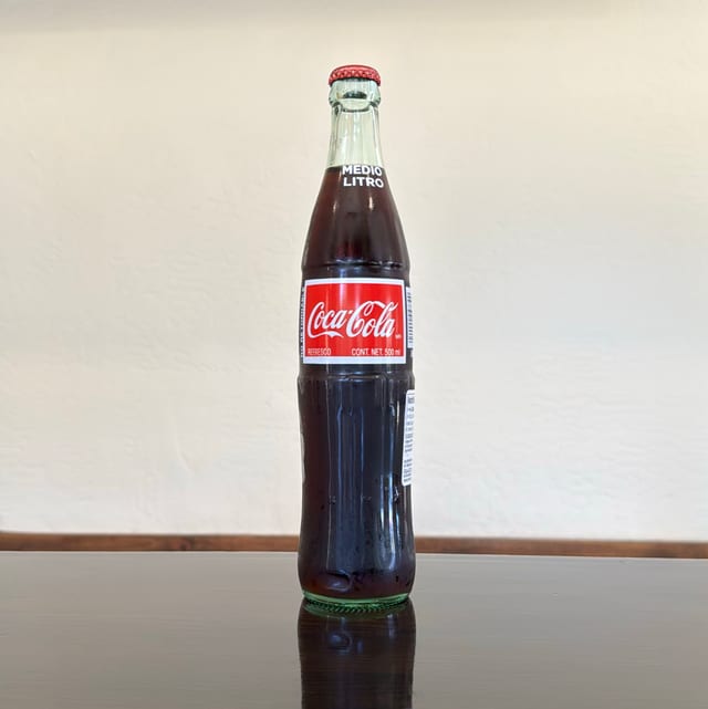 Coca 1/2.